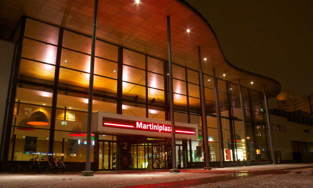 Lighted head entrance of MartiniPlaza, venue of the EPF conference 2025